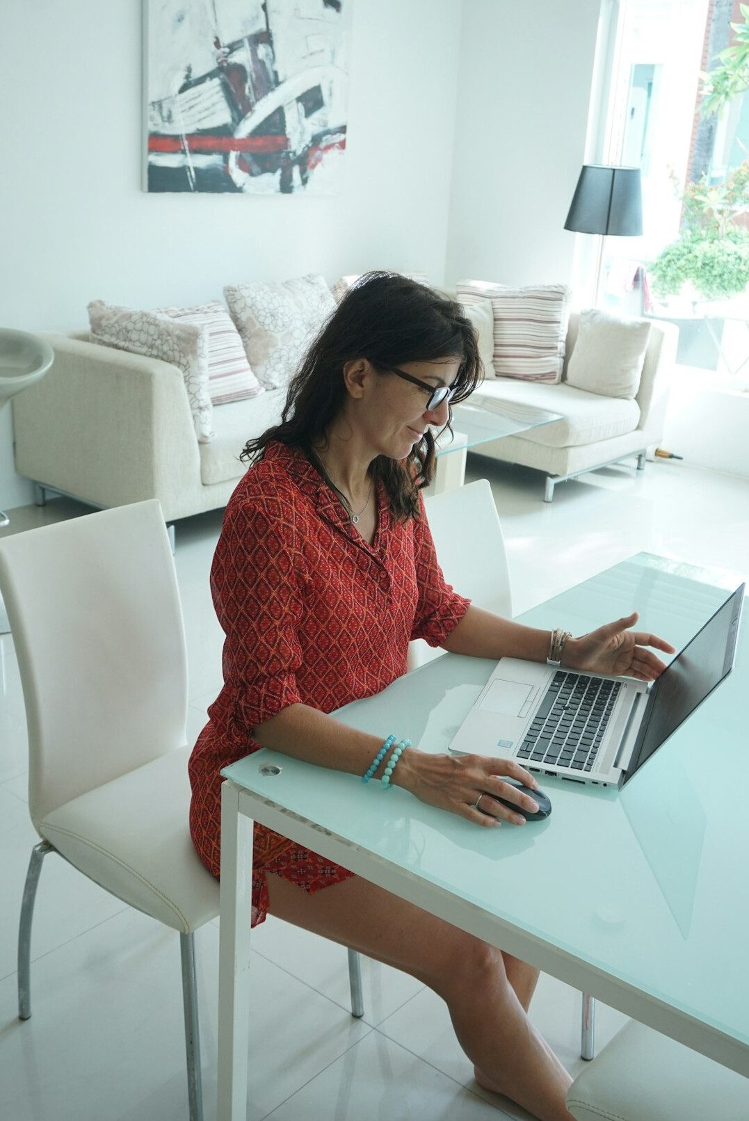 woman working on laptop at home