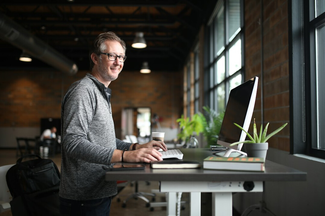 successful programmer smiling